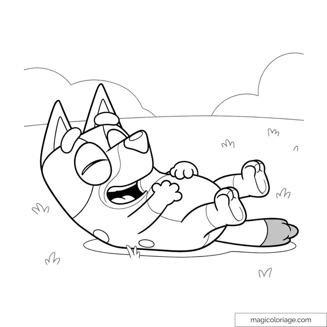Bluey riant allongé dans l’herbe